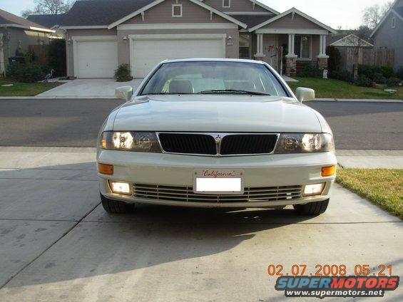 White sedan front view with California license plate