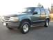1997 Ford Explorer - This 1997 Ford Explorer is shown in a 3/4 front view, highlighting its exterior details.