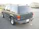 1997 Ford Explorer - This 1997 Ford Explorer is seen from the rear, tinted windows and a trailer hitch.
