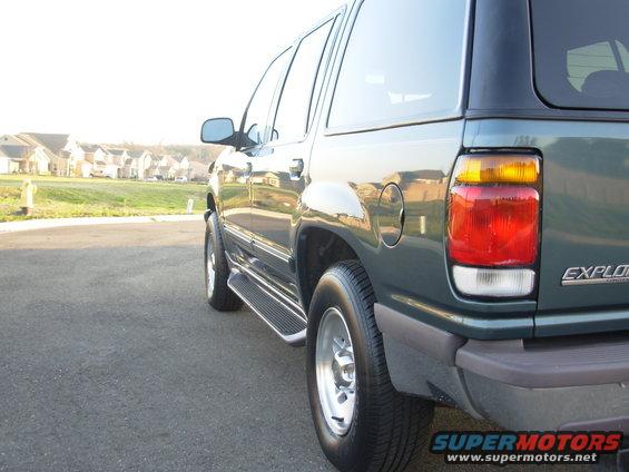 1997 Ford Explorer rear quarter panel and taillight, dark green paint