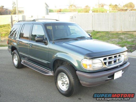 Green 1997 Ford Explorer 3q-front view