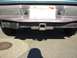 1997 Ford Explorer - The rear of a vehicle shows a trailer hitch and a California license plate with an expiration sticker for 2011.