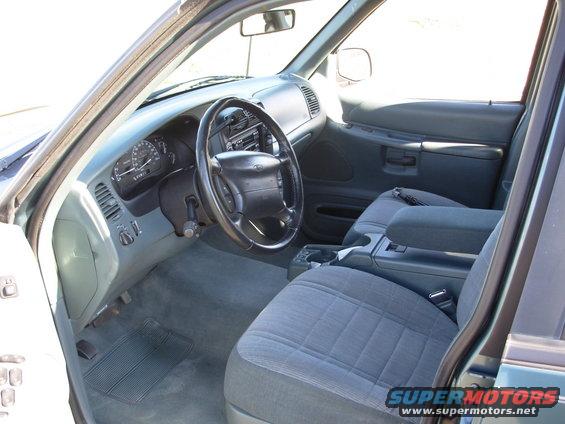 1997 Ford Explorer interior showing dashboard, steering wheel, and front seats