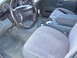 1997 Ford Explorer - The interior of a 1997 Ford Explorer shows its dashboard, steering wheel, and front seats.