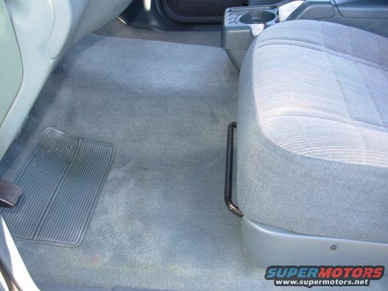 1997 Ford Explorer interior showing passenger seat and floor mat