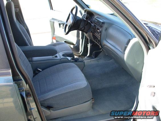 Front seats, dashboard, and center console of a car