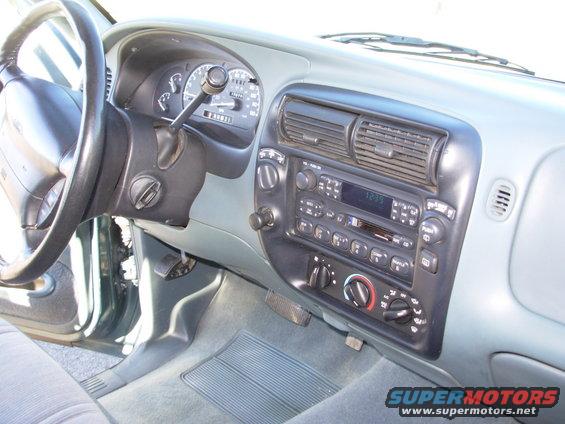 Interior view of 1997 Ford Explorer dashboard with radio and gauges