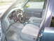1997 Ford Explorer - Interior view of a 1997 Ford Explorer, highlighting the dashboard and seating.