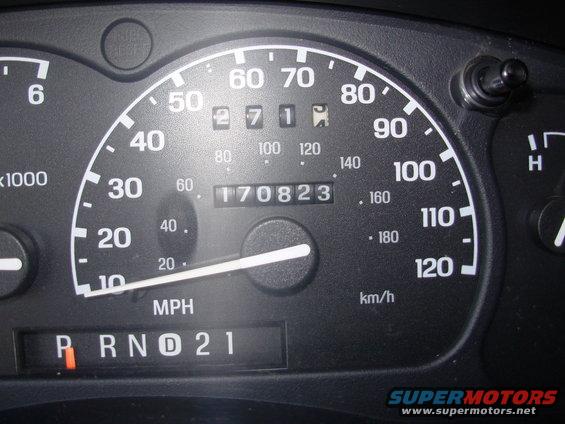 Dashboard gauges showing 170,823 miles and PRND21 gear selection