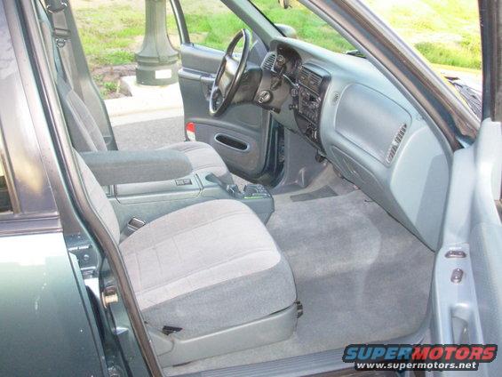 1997 Ford Explorer interior showing front seats, dashboard, and center console