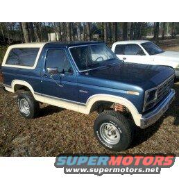 Blue and white 1983 Ford Bronco, 3/4 front view