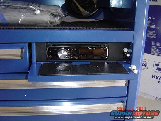 Pioneer car stereo installed in a blue metal toolbox with drawers