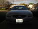 2003 Ford Taurus - Front view of a silver sedan, identified as a 2003 Ford Taurus, with its license plate visible.