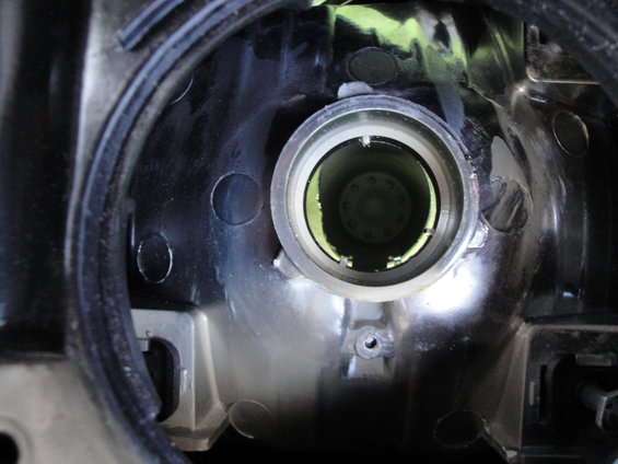 Headlight housing interior with bulb socket