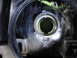 2003 Ford Taurus - Close-up view of the interior of a vehicle's headlight housing, showing the bulb socket.