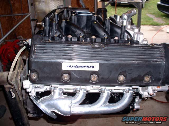 "New" engine with shorty headers.