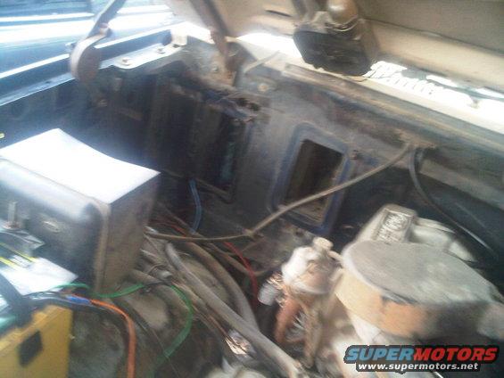 1986 Ford Bronco engine bay with exposed wiring and air filter