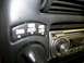 1994 Ford Explorer - Close-up of a vehicle's interior dashboard controls, showing a 4WD selector and a Kenwood car stereo.