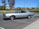 1973 Ford Torino - A silver 1972 Ford Gran Torino Sport is parked in an outdoor lot under a clear blue sky.