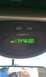 1999 Ford Expedition - The overhead console displays average fuel economy and a mode indicator.