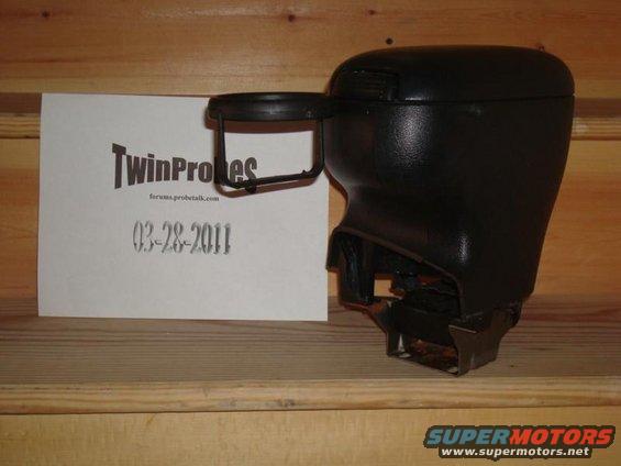 Black car armrest next to a card with 'TwinProbes forums.probeltalk.com 03-28-2011' printed on it