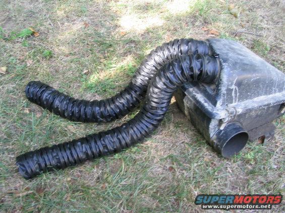 Cut in half and mounted to airbox