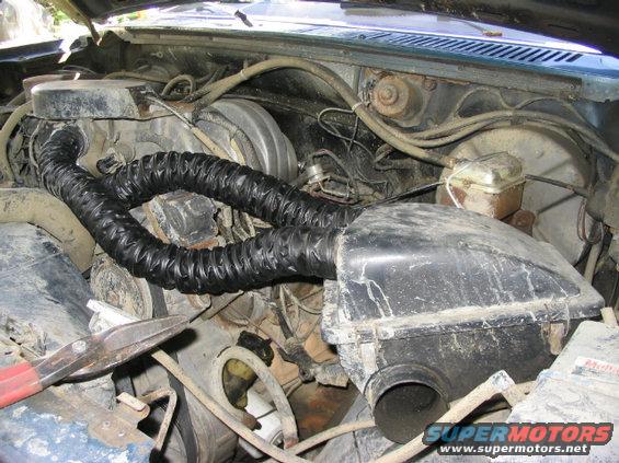 100_0081.jpg Mounted to engine intake