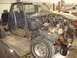 1993 Ford F-150 - Truck disassembled in a garage with engine bay stripped and doors open.