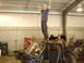 1993 Ford F-150 - Two men celebrate inside a garage with a disassembled truck.