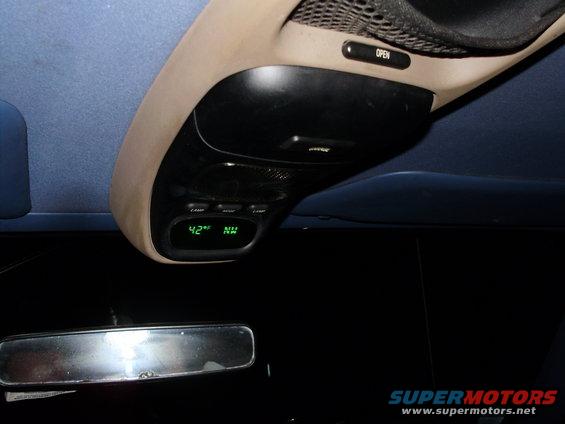 Overhead console with digital temperature and compass display, and a rearview mirror