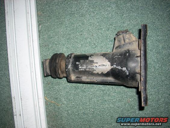 Clutch slave cylinder with visible part numbers