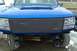 1993 Ford F-150 - Front view of a blue 1992 Ford F-150 showing its chrome grille and tow hooks.