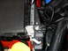 2012 Ford Mustang - A detailed view of the electrical components and wiring within a vehicle's engine compartment.