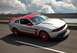 2012 Ford Mustang - The optional Laguna Seca Package includes race-compound tires, an aggressive front air splitter and rear pedestal spoiler, standard Torsen…