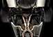 2012 Ford Mustang - The undercarriage of a vehicle, showing the exhaust pipes, differential, and rear tires.
