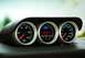 2012 Ford Mustang - Interior shot of Ford gauges displaying oil pressure and coolant temperature readings.