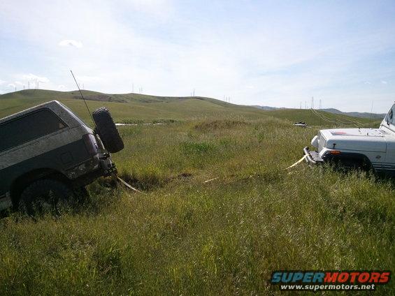 Backed onto the hill and towed the stuck jeep down haha