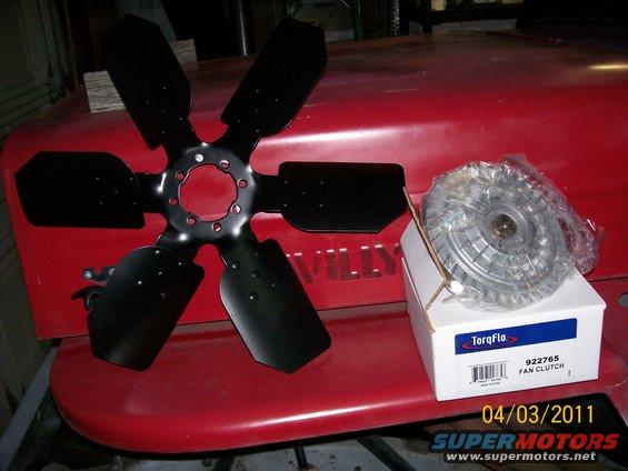 Fan clutch and fan blade on red surface with "WILLYS" visible