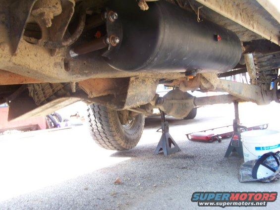 Undercarriage of 1989 Ford Bronco with aftermarket tank installed