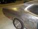 1971 Dodge Dart - A car body, possibly a 1970s Mopar, is shown in primer, with another dark car in the background.