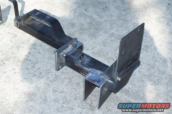 Custom fabricated metal part with mounting brackets and angled plates