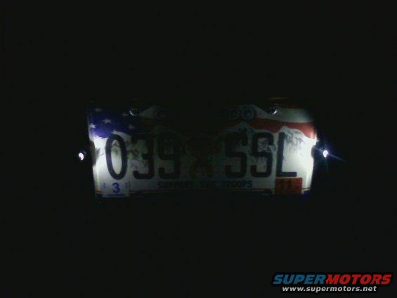 License plate with numbers 039 55L and American flag design