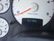 2005 Dodge 2500 - Dashboard gauges display an odometer reading of 33,705 and the tachometer.