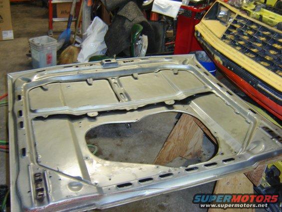 sanding the underside of hood.