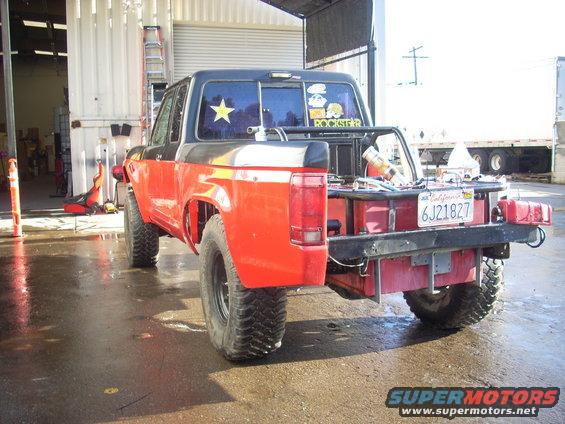 1992 Ford Ranger pickup truck with custom rear bumper and bed modifications, California license plate 6J21827