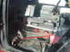 1992 Ford Ranger - The interior of a truck cab shows the floor, seats, and dashboard, with some visible wear and tear.
