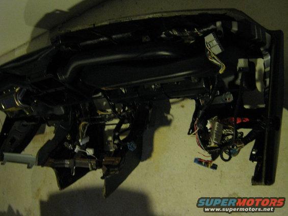 img_1605.jpg Close up of dash. Some wires cut. Can't remember why....