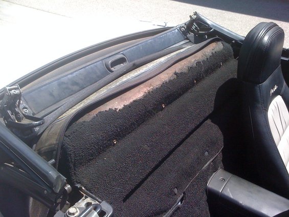 1991 Mazda Miata interior showing worn carpet and seat
