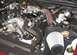 2004 Mercury Grand Marquis - Engine bay features a chrome intake tube and a large air filter, with a 'Hot Rod Power Club' sticker on the airbox.