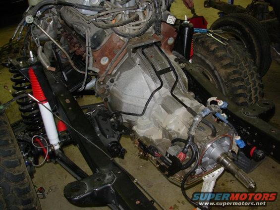 sw14.jpg He's decided to keep everything together and use all the donor wiring, emissions, & electronics.  Only a few things are being deleted, like ABS, PW/PL/PM...  He didn't have the TC fully seated in the trans, so after we got that fixed, we plugged everything in & started it for a few seconds just to check the wiring harness.